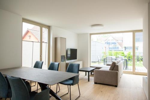 Televiisor ja/või meelelahutuskeskus majutusasutuses Strandläufer 1