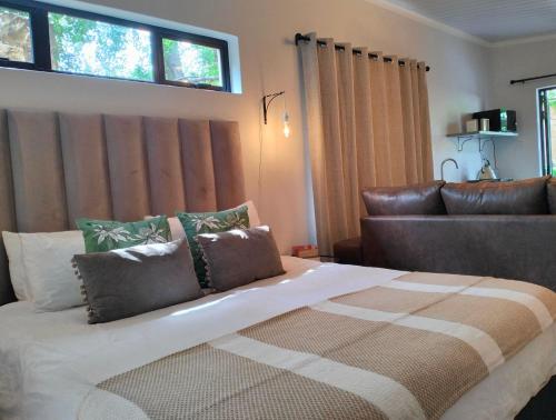 Ένα ή περισσότερα κρεβάτια σε δωμάτιο στο On the Lake