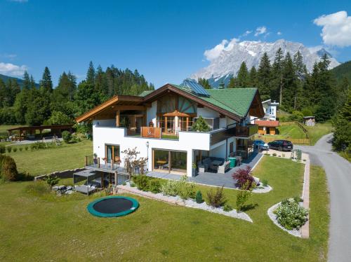 an aerial view of a house in the mountains at Apartment Zugspitze in Biberwier