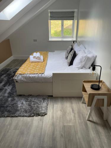 Katil atau katil-katil dalam bilik di Faerdre Manor Large Holiday Home