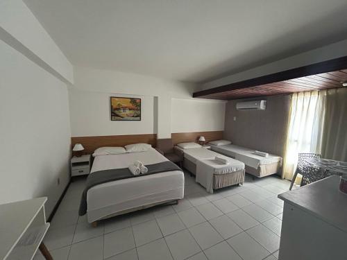 Uma cama ou camas num quarto em Apart-Hotel em Tambaú - Super Central com Vista Mar - Ap.113