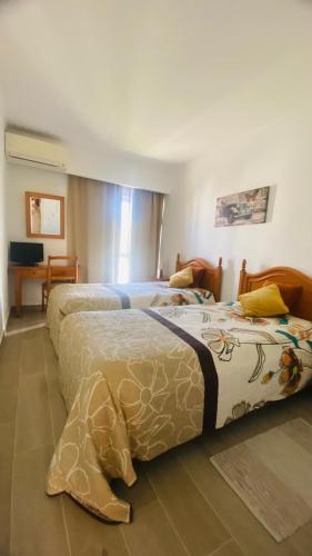 Apartamento relaxante com terraço e próximo da praia, no 2º andar
