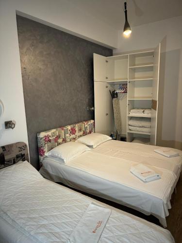 Postel nebo postele na pokoji v ubytování Orange Apartment 2