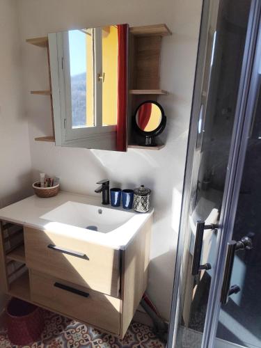 a bathroom with a sink and a shower at Casa Louisa in Serralongue