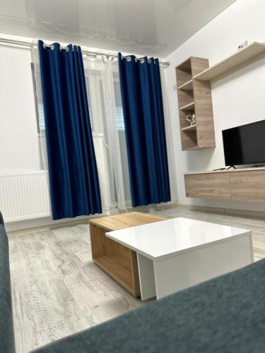 TV a/nebo společenská místnost v ubytování Studio Demy