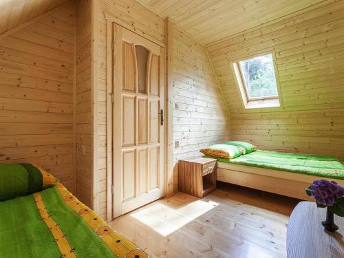 Postel nebo postele na pokoji v ubytování Holiday Home Pobierowo near Baltic Sea