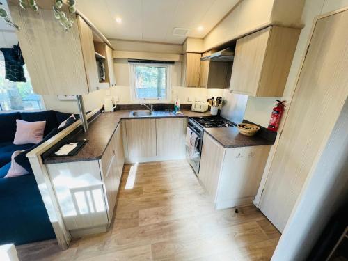 an aerial view of a kitchen in a caravan at 3 Bedroom Caravan LG3, Lower Hyde, Shanklin in Shanklin