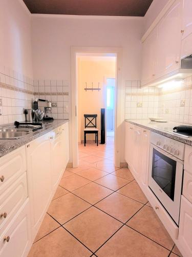 Una cocina o cocineta en Rosa Blu