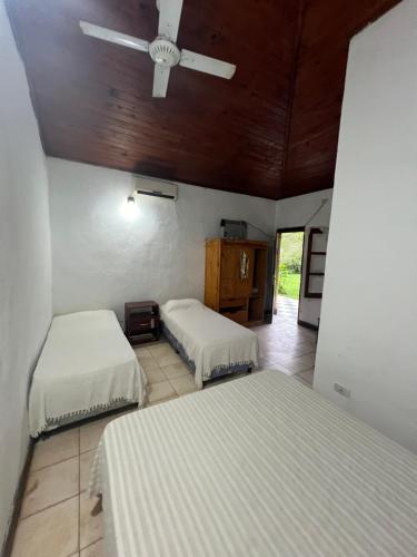 Postel nebo postele na pokoji v ubytování Posada el Yacaré