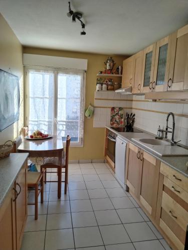 Appartement 65m2/2piéces/centre/parking privé