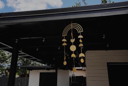 a chandelier hanging from the ceiling of a building at Centrally Located! Remodeled! Huge Backyard! The White House in Albuquerque