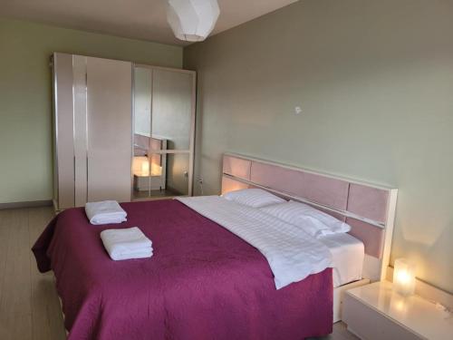 Postel nebo postele na pokoji v ubytování Guest Apart Arda