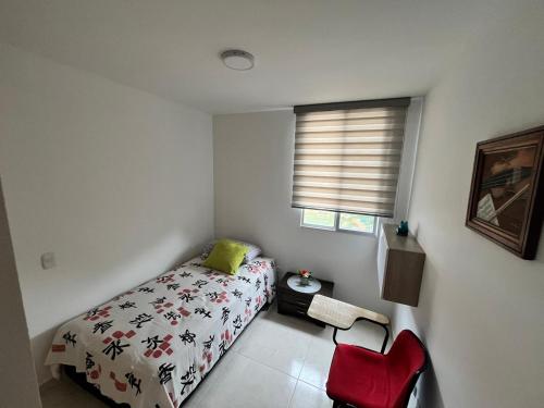 Postel nebo postele na pokoji v ubytování Apartamento Mallorca La Samaria Ibagué