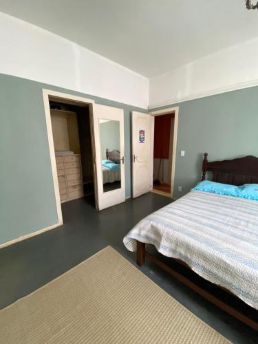 Ένα ή περισσότερα κρεβάτια σε δωμάτιο στο Villa Aruanda