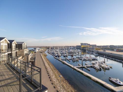 a group of boats docked in a marina at Penthouse in Sint-Annaland by the Beach in Sint Annaland