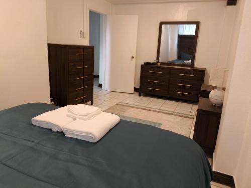 Postel nebo postele na pokoji v ubytování Paradise Inn