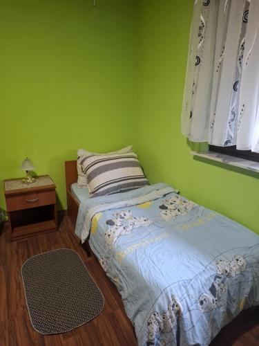 Postel nebo postele na pokoji v ubytování Apartman Konjević