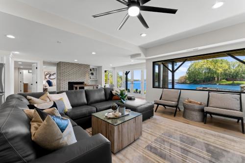 a living room with a couch and a table at Fox Run LKN in Denver