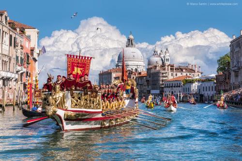 a group of boats in the water with people on them at Jesolo Sun Beach House - Host Solution in Lido di Jesolo