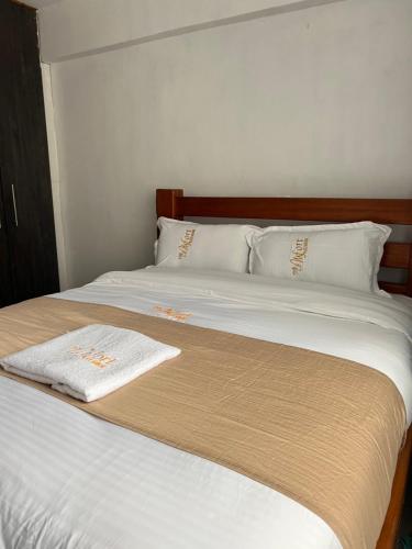 Ένα ή περισσότερα κρεβάτια σε δωμάτιο στο Stylish 2 bedrooms in kericho town