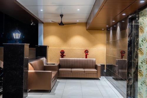 Un lugar para sentarse en Golden Oasis Suites