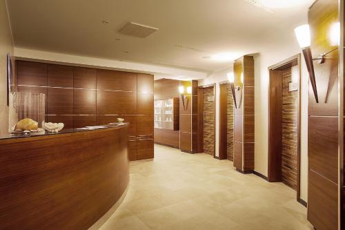 The lobby or reception area at Spa & Wellness Hotel Pinia