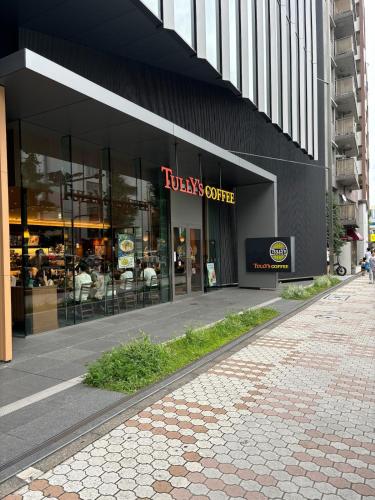 a view of a building with a tvs corner at Tokyo Base Meguro Room #301 in Tokyo