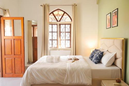 Gallery image of Villa Oreka - Artistic 3BHK Farm Villa in Parra, near Coconut Tree Rd in Parra