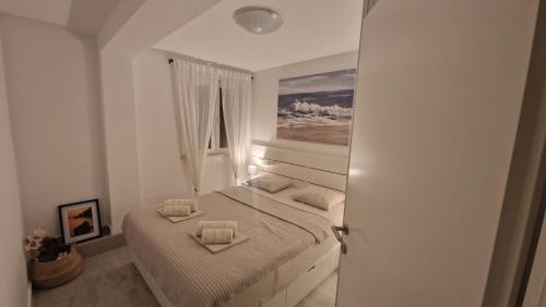 Postel nebo postele na pokoji v ubytování Apartments KUS Ugljan