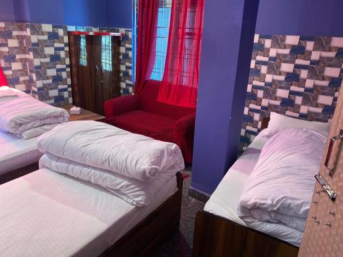 Hotel Annapurnaにあるベッド