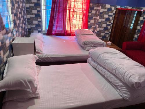 Hotel Annapurnaにあるベッド