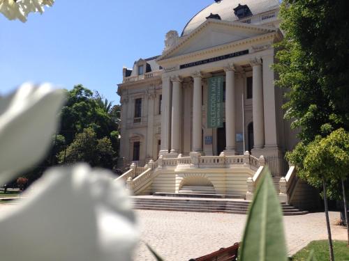 a building with a dome on top of it at Azzaí Bellas Artes in Santiago
