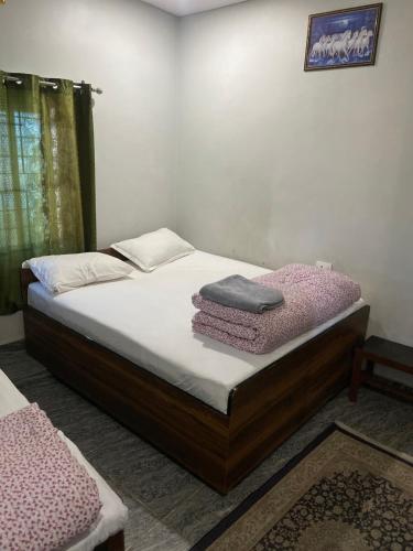 Hotel Annapurnaにあるベッド