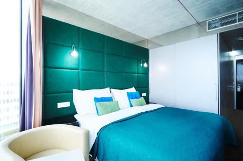 Una cama o camas en una habitación de SONO hotel
