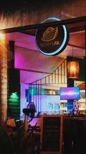 a restaurant with a sign that says noishi sushi at Noahs Ark in Amphoe Koh Samui
