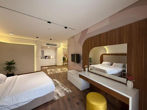 Postel nebo postele na pokoji v ubytování Tolip Family Park Hotel