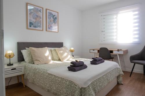 Postel nebo postele na pokoji v ubytování Mandarina 5