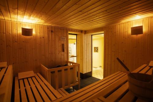 an inside view of a sauna with wooden walls at Romantikhotel Platte in Attendorn