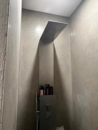 a bathroom with a mirror on the wall at inCentRo in Cremona