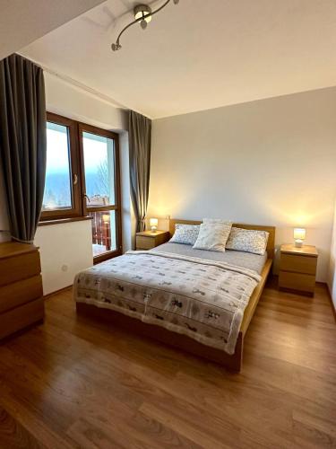 Postel nebo postele na pokoji v ubytování Apartman Kamzik Teo