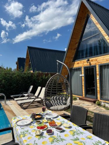 Swimmingpoolen hos eller tæt på Teona Kartepe Bungalov