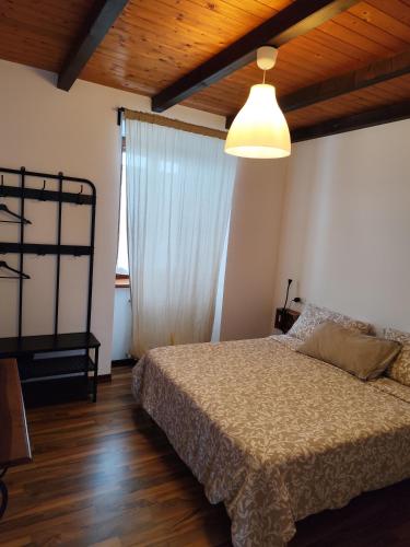 Ένα ή περισσότερα κρεβάτια σε δωμάτιο στο B & b da Gisella - Agriturismo Podere Barzia