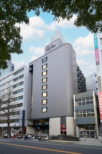 a building with an audi sign on the side of it at Hotel Resol Nagoya in Nagoya