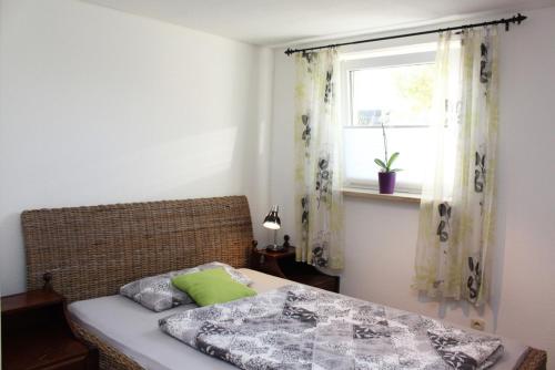 Postel nebo postele na pokoji v ubytování Ferienwohnung Eichenweg - Wohnung I