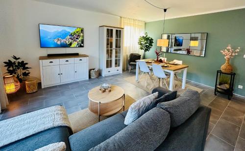 TV a/nebo společenská místnost v ubytování FeWo Henryk