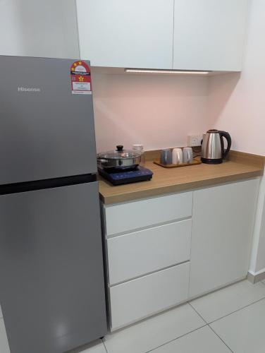 Kuchyň nebo kuchyňský kout v ubytování Shines GuestHouse 1Br Hi-Privacy Condo