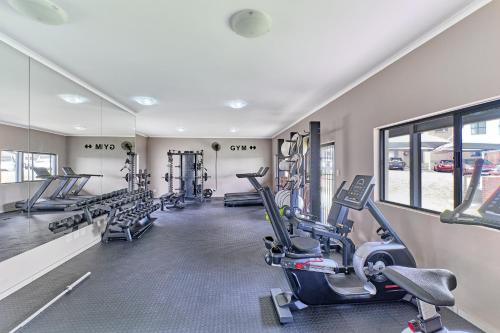 a gym with treadmills and cardio equipment in a building at Luxury Living at Canvas 82 Unit 129 in Four Ways
