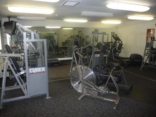 a gym with a bike and several tread machines at Travelodge by Wyndham Hermiston in Hermiston