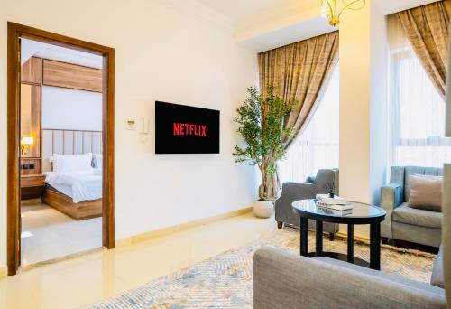 Μια τηλεόραση ή/και κέντρο ψυχαγωγίας στο 1BHK , 5 mins from DXB airport & metro