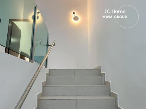 a set of stairs in a building with a light at Kluang Gunung Lambak view Family Suites in Kluang